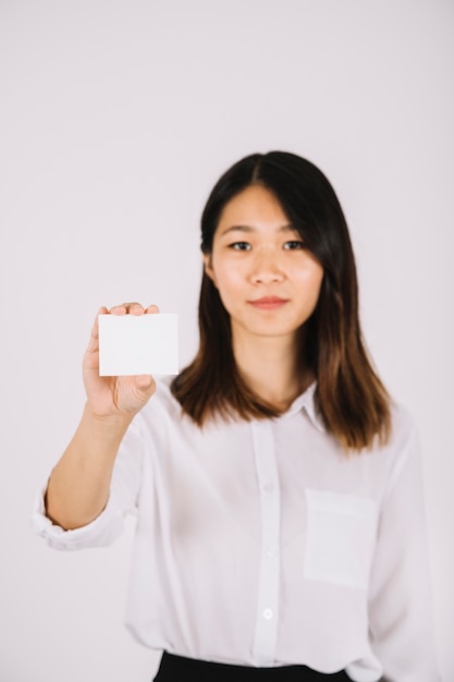 Businesswoman presenting business card