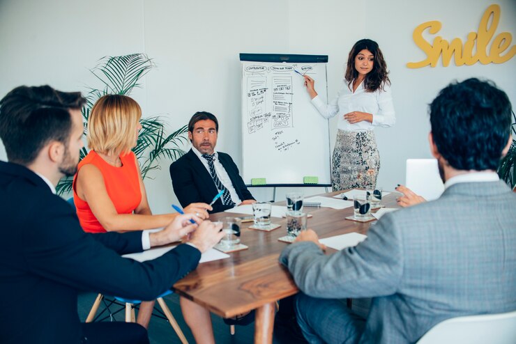 Free Photo businesswoman showing her strategy