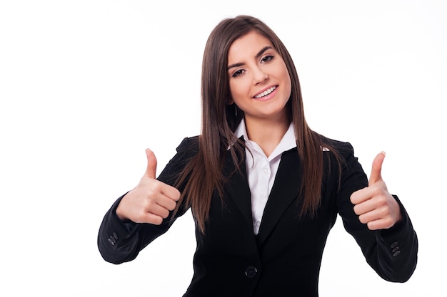 Businesswoman showing thumbs up