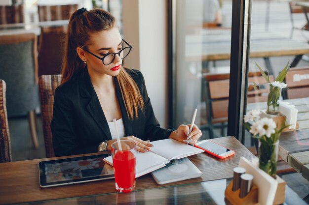 Businesswoman sitting in a cafe