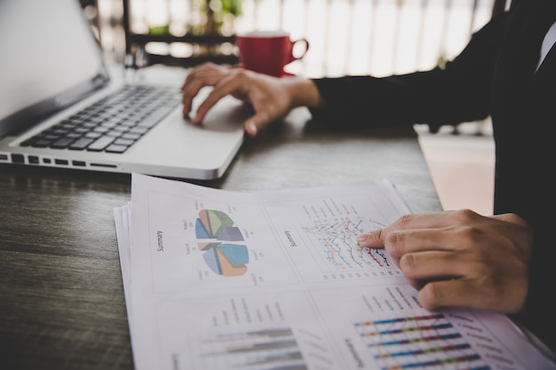 Businesswoman sitting in desk and work with financial documents company 