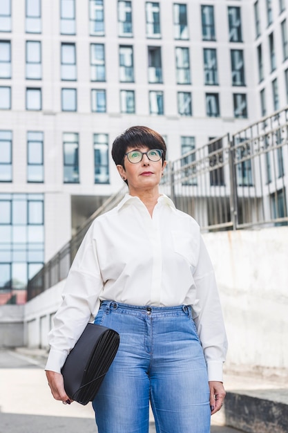 Businesswoman standing and looking confident