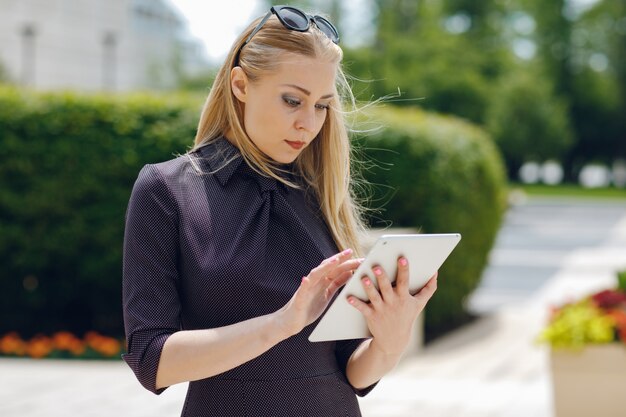 businesswoman in a summer city