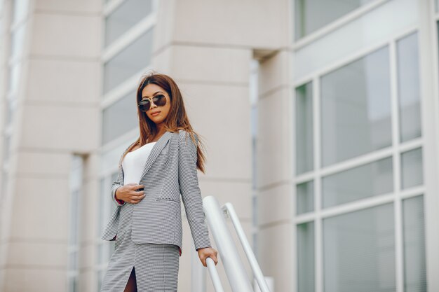 businesswoman in a summer city