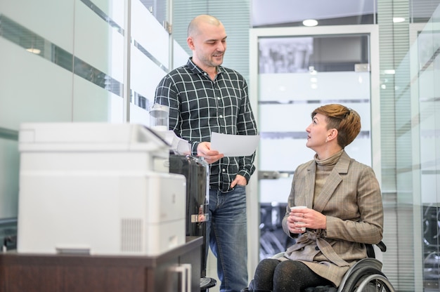 Businesswoman in wheelchair in the office