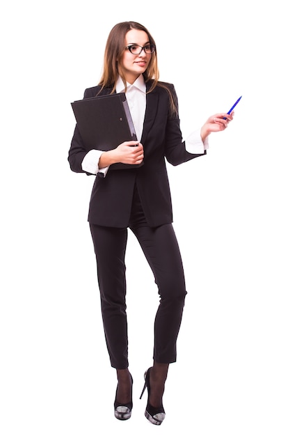 Businesswoman with clipboard and pen point up isolated on white wall