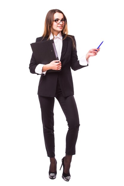 Businesswoman with clipboard and pen point up isolated on white wall