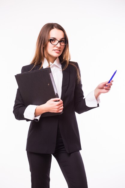 Businesswoman with clipboard and pen point up isolated on white wall