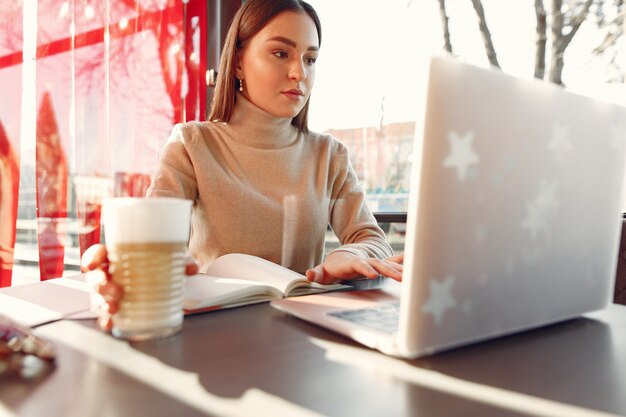 Businesswoman working in a cafe