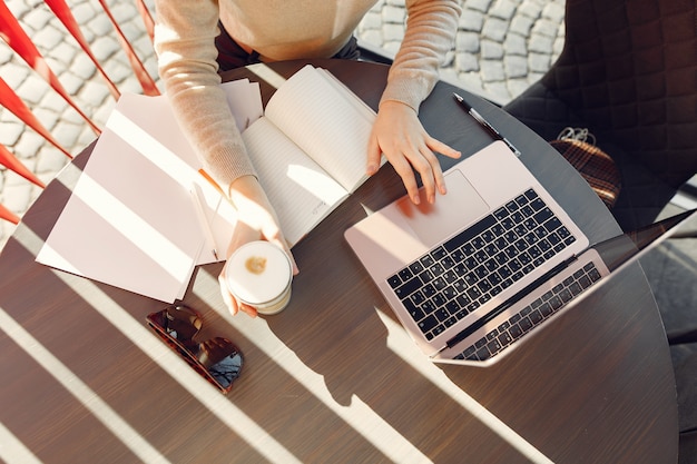 Businesswoman working in a cafe