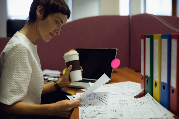 Businesswoman working at her desk