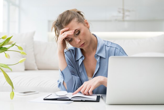 Businesswoman working at home