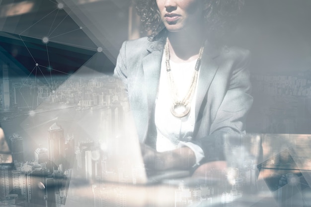 Businesswoman working on a laptop background