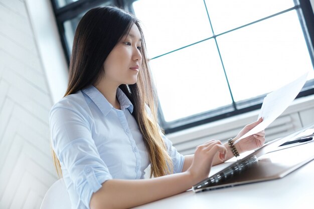 Businesswoman working at the office