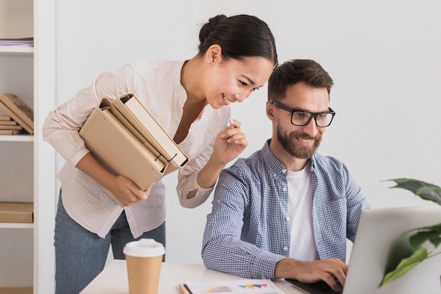 Businesswoman working with businessman