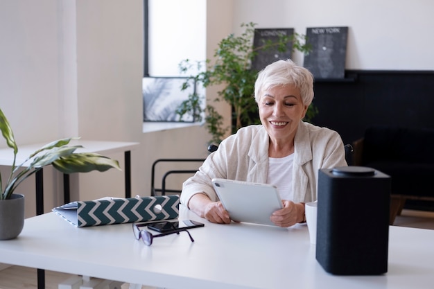 Businesswoman working with digital assistant