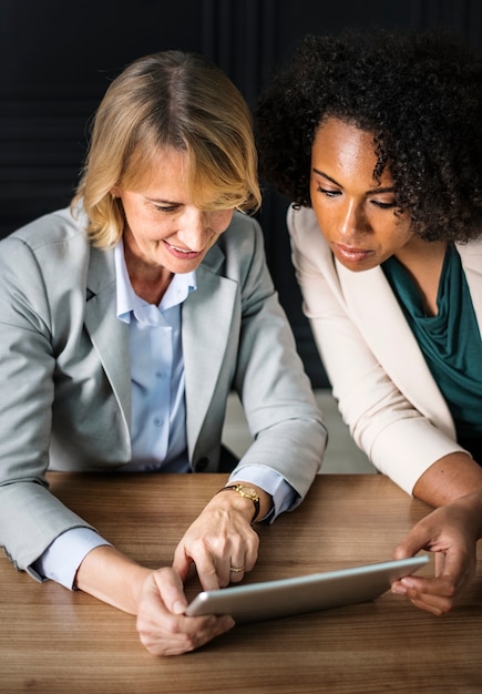 Businesswomen using a digital tablet