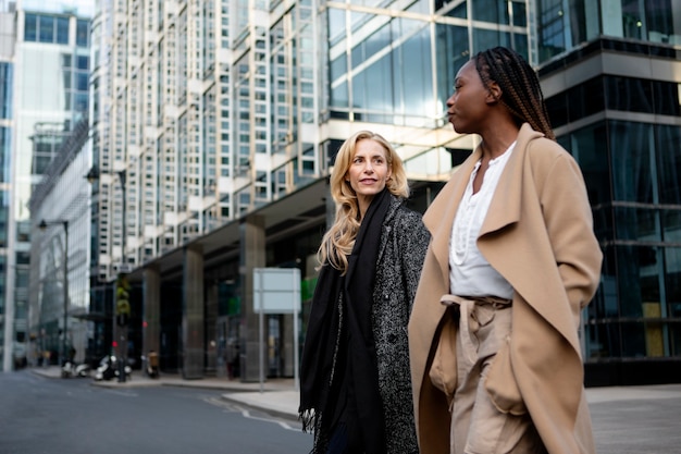 Businesswomen walking together to the work place