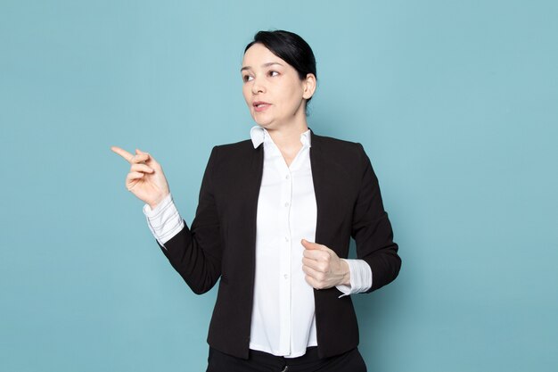 Bussinesswoman in black suit pointing