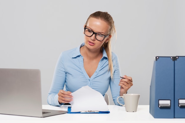 Busy businesswoman during the office work
