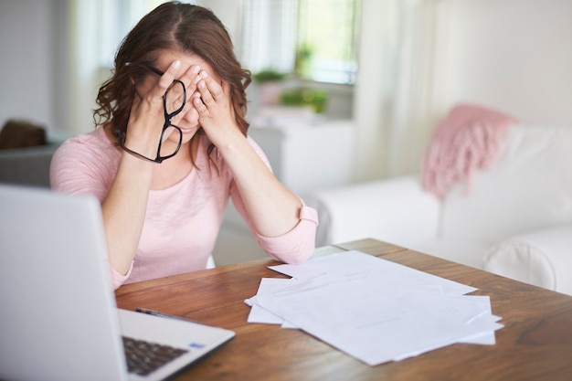 Busy businesswoman working at home office