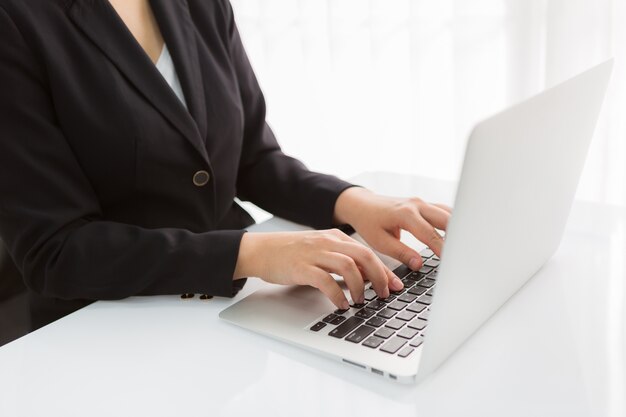 Busy employee working with laptop