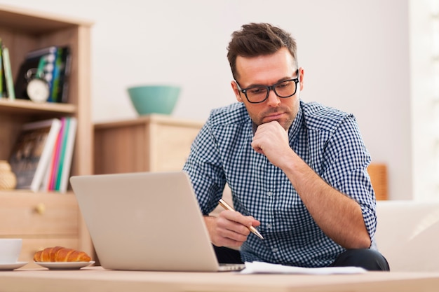 Busy man working at home