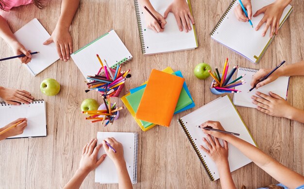 Busy students over one table