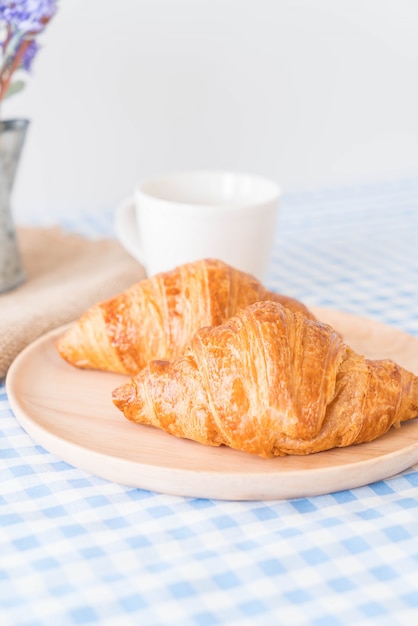 butter croissant on table