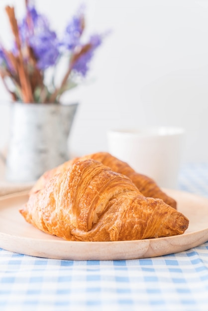 butter croissant on table