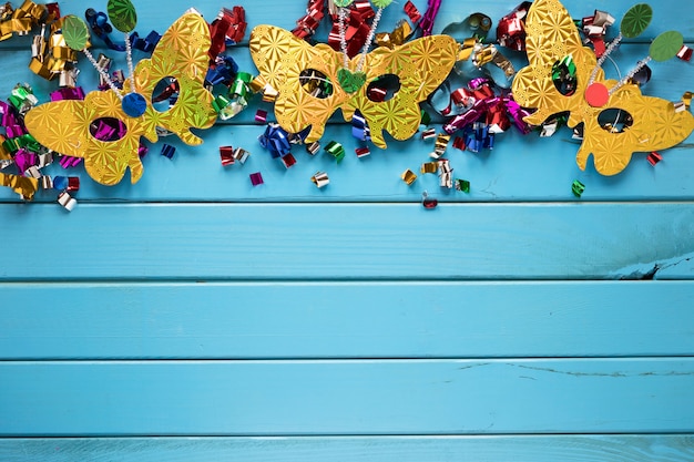 Butterfly masks on confetti