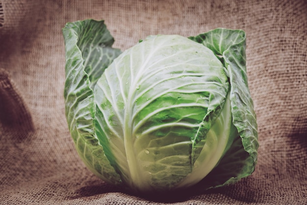 Free photo cabbage on burlap background