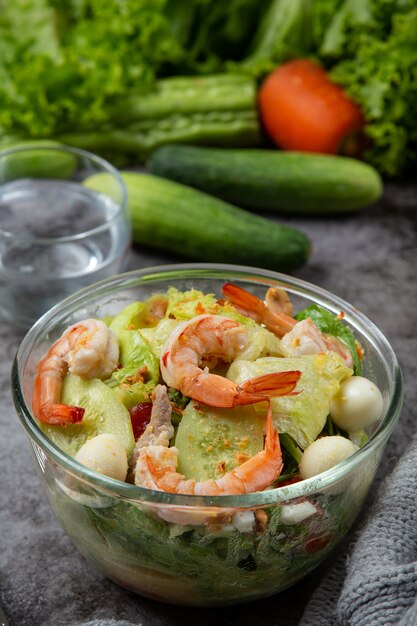 Caesar prawn salad with delicious shrimp Healthy food concept.