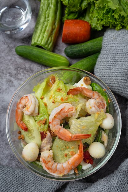 Caesar prawn salad with delicious shrimp Healthy food concept.