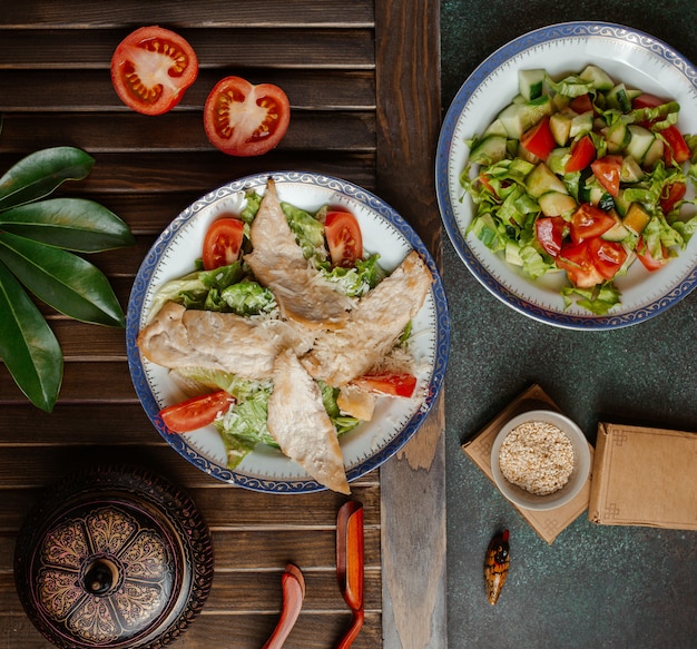 Caesar and vegetable salad with full of greenery .image