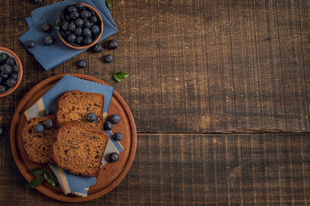 Cake and blueberries with copy space background