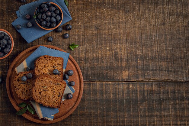 Cake and blueberries with copy space background