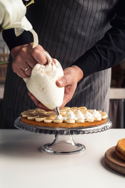 Cake with banana and whipping cream