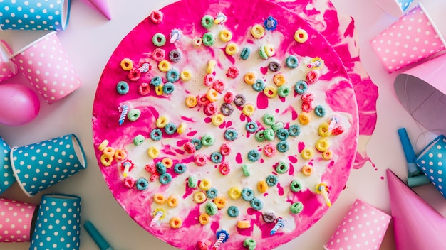 Cake with cereal loops and party stuff