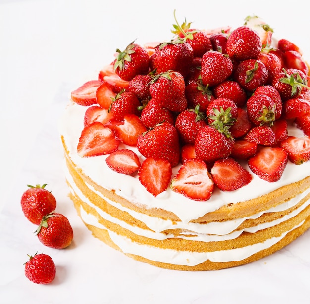 Cake with cherries and strawberries