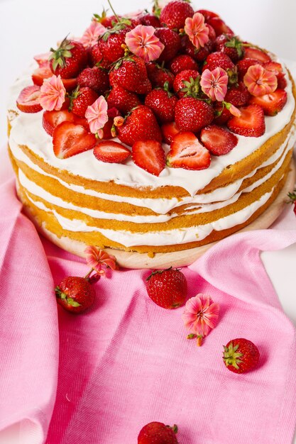 Cake with cherries and strawberries