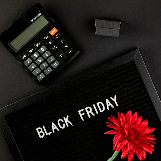 Free photo calculator next to a black friday carpet