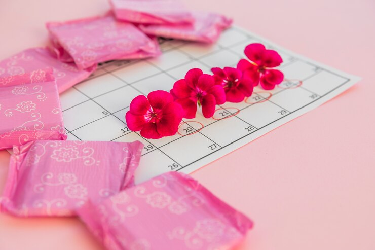 無料Photo 花と生理用ナプキンのカレンダー