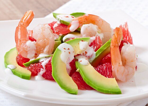 California salad - a mix of avocado, grapefruit and shrimp, seasoned with cayenne pepper yogurt