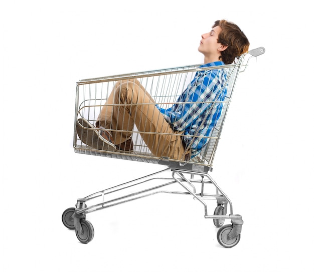 Calm teenager sitting on a cart