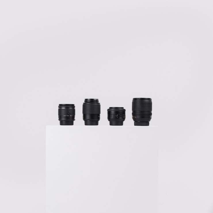 Free Photo camera lenses arranged on white block against isolated on white background