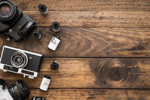 Cameras and film cassettes of timber tabletop
