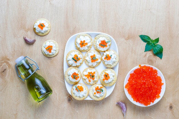 Canape with red caviar for party.