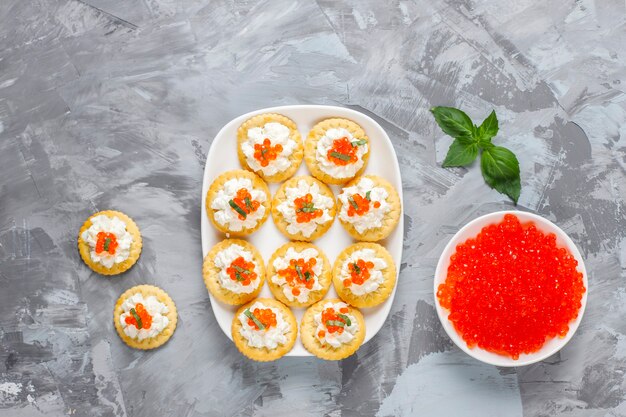 Canape with red caviar for party