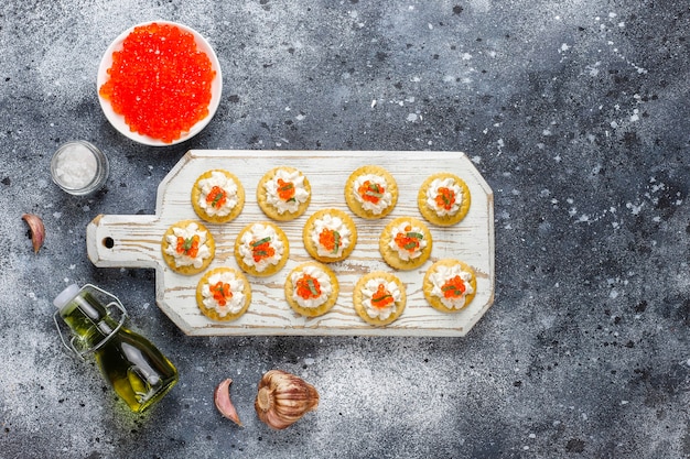 Canape with red caviar for party.